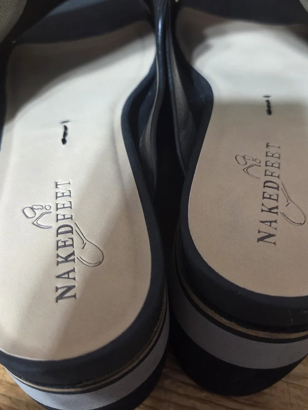 Naked Feet Shoes featuring a multi-tone gray and black stacked wedge Womens 9